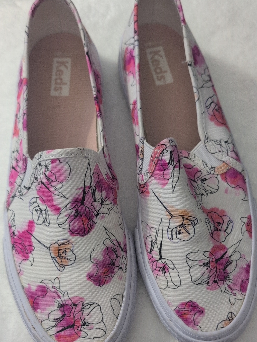 Keds Floral Slip-On Sneakers in White with Pink and Peach Accents